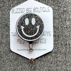 Smiley face retractable name badge reel ID holder